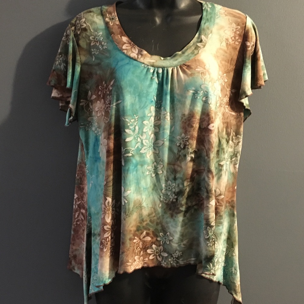 Woman’s dress top with sides a little longer